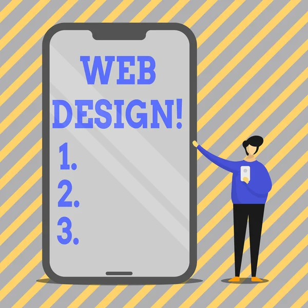 Note d'écriture montrant Web Design. Photo d'affaires mettant en valeur le processus de création de sites Web production de contenu et graphique homme présentant Smartphone énorme tout en tenant un autre mobile . — Photo