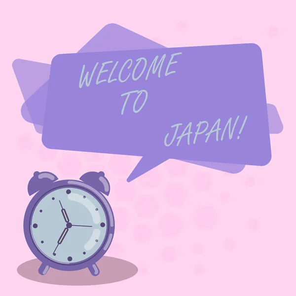 Word schrijven tekst Welkom naar Japan. Businessconcept voor Arriving aan Aziatische modern land verschillende cultuur lege rechthoekige kleur toespraak Bubble Overlay en Analog Alarm Clock. — Stockfoto