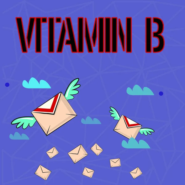 Writing note showing Vitamin B. Business photo showcasing Highly important sources and benefits of nutriments folate Colorful Airmail Letter Envelopes and Two of Them with Wings. — Stock Photo, Image