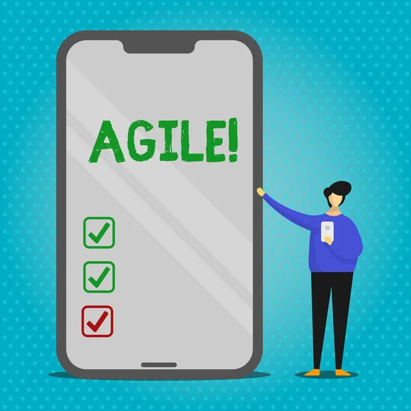 Text sign showing Agile. Conceptual photo Develop an agility towards technological chnage Man Presenting Huge Blank Screen Smartphone while Holding Another Mobile.