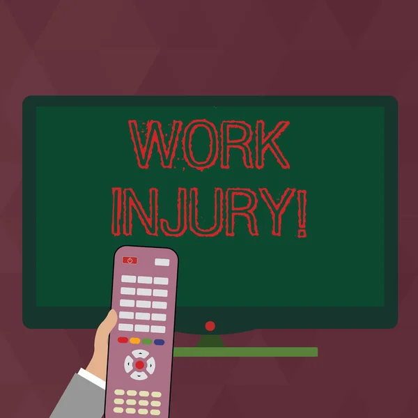 Writing note showing Work Injury. Business photo showcasing accident that occurred during and as result of working Hand Holding Remote Control infront of Wide Color PC Screen.