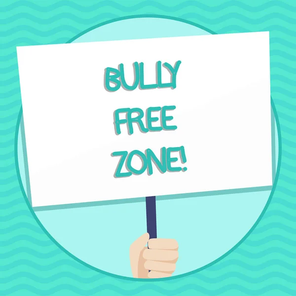 Word writing text Bully Free Zone. Business concept for creating abuse free school college life Hand Holding Blank White Placard Supported by Handle for Social Awareness. — Stock Photo, Image