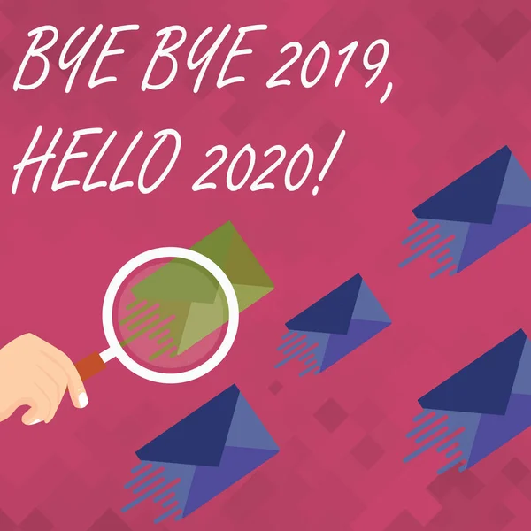 Word writing text bye 2019 hallo 2020. business concept for say goodbye to last year and welcome another good one lupe on one different color umschlag and other has same shade. — Stockfoto