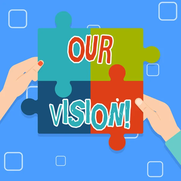 Writing note showing Our Vision. Business photo showcasing serves as clear guide for choosing current and future actions Multi Color Jigsaw Puzzle Pieces Put Together by Human Hands.