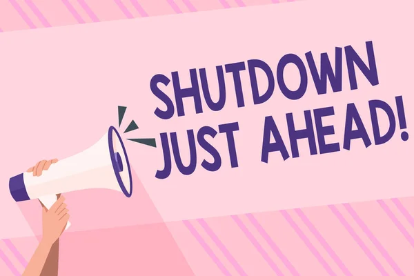 Text sign showing Shutdown Just Ahead. Conceptual photo closing factory business either short time or forever Human Hand Holding Tightly a Megaphone with Sound Icon and Blank Text Space. — Stock Photo, Image