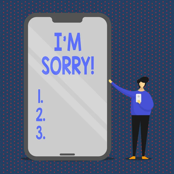 Conceptual hand writing showing I M Sorry. Business photo text telling someone that you are ashamed or unhappy about something Man Presenting Huge Smartphone while Holding Another Mobile. — Stock Photo, Image