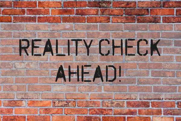 Handwriting text Reality Check Ahead. Concept meaning Unveil truth knowing actuality avoid being sceptical Brick Wall art like Graffiti motivational call written on the wall.