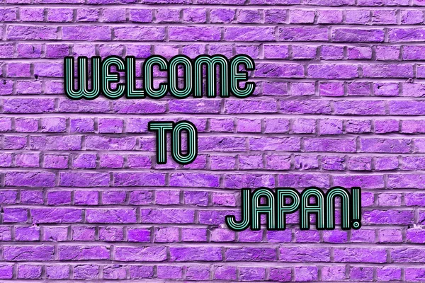 Escritura a mano conceptual que muestra Bienvenido a Japón. Texto de la foto de negocios Llegando al país asiático moderno cultura diferente Ladrillo Arte de la pared como Graffiti llamada motivacional escrita en la pared . — Foto de Stock