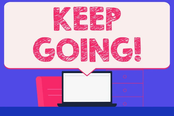 Text sign showing Keep Going. Conceptual photo make effort to live normally in spite of difficulty situation Blank Huge Speech Bubble Pointing to White Laptop Screen in Workspace Idea.