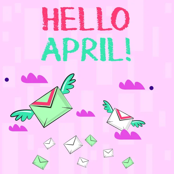 Nota de redação mostrando Olá April. Foto de negócios mostrando acolhedor quarto mês do ano geralmente considerado primavera colorido Envelopes carta de correio aéreo e dois deles com asas . — Fotografia de Stock