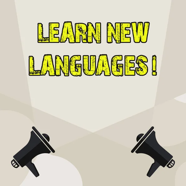 Conceptual hand writing showing Learn New Languages. Business photo showcasing developing ability to communicate in foreign lang Blank Spotlight Crisscrossing Upward Megaphones on the Floor. — Stock Photo, Image