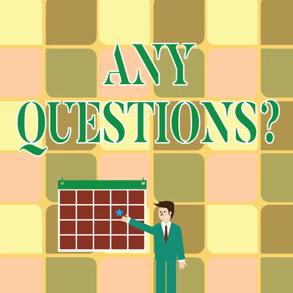 Text sign showing Any Questions Question. Conceptual photo you say write order to ask demonstrating about something Businessman Smiling and Pointing to Colorful Calendar with Star Hang on Wall.