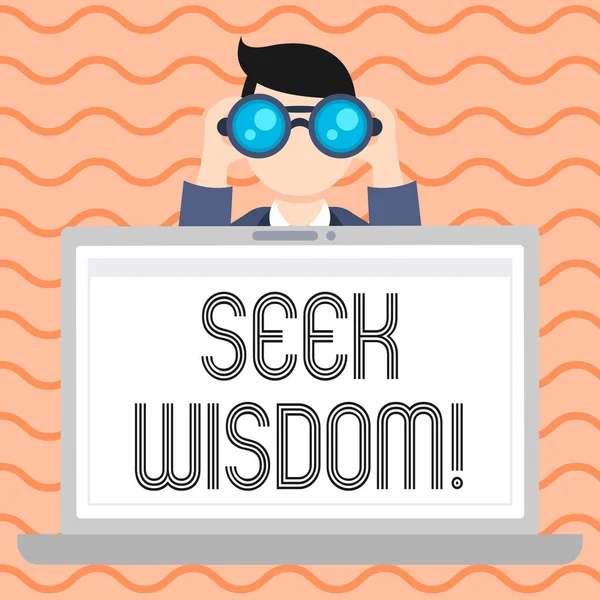 Conceptual hand writing showing Seek Wisdom. Business photo showcasing ability to think act using knowledge experience understanding Man Holding and Looking into Binocular Behind Laptop Screen.