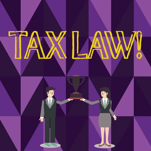 Word writing text Tax Law. Business concept for governmental assessment upon property value or transactions Man and Woman in Business Suit Holding Together the Championship Trophy Cup. — Stock Photo, Image