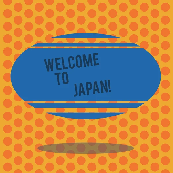 Escrevendo nota mostrando Bem-vindo ao Japão. Foto de negócios mostrando Chegando ao país moderno asiático cultura diferente Forma oval de cor em branco com faixa horizontal flutuante e sombra . — Fotografia de Stock