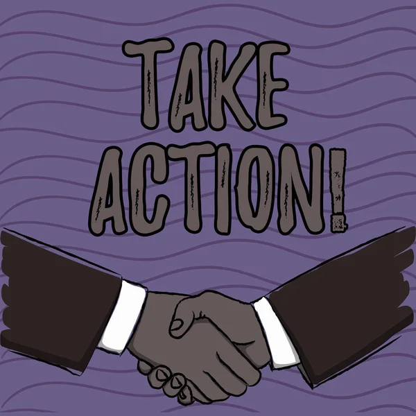 Word writing text Take Action. Business concept for do something official or concerted to achieve aim with problem Businessmen Shaking Hands Firmly as Gesture Form of Greeting and Agreement.