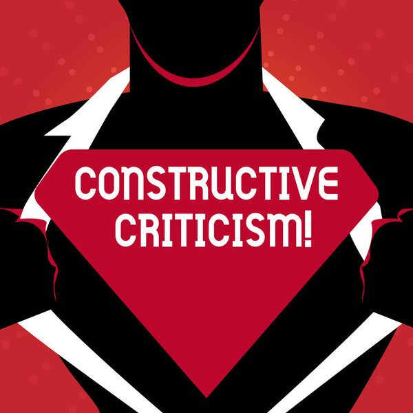 Writing note showing Constructive Criticism. Business photo showcasing process of offering valid and well reasoned opinions Man Opening his Shirt to reveal the Blank Triangular Logo.