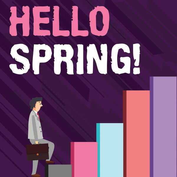 Writing note showing Hello Spring. Business photo showcasing Welcoming season comes after winter Blossoming of plantes Man Carrying a Briefcase in Pensive Expression Climbing Up. — Stock Photo, Image