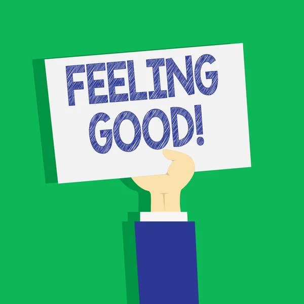 Bemutató Feeling Good szöveg-jel. Ami boldog élet pozitív érzelmek elégedettség Clipart a kéz tartja fel üres fehér papírlapra pasztell hátteret a fogalmi fénykép. — Stock Fotó