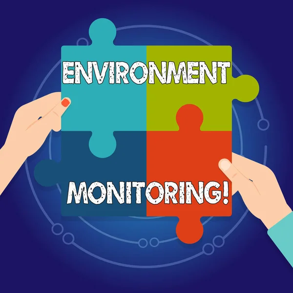 Text sign showing Environment Monitoring. Conceptual photo observing and studying conditions of the environment Four Blank Multi Color Jigsaw Puzzle Tile Pieces Put Together by Human Hands.
