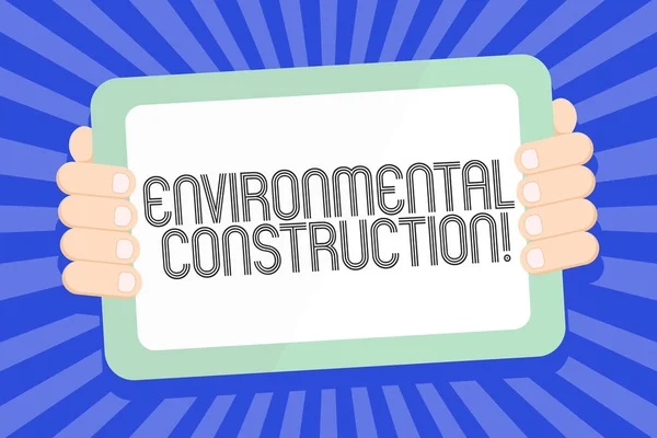 Text sign showing Environmental Construction. Conceptual photo knowledgeable about sustainable building practice Color Tablet Smartphone with Blank Screen Handheld from the Back of Gadget. — Stock Photo, Image