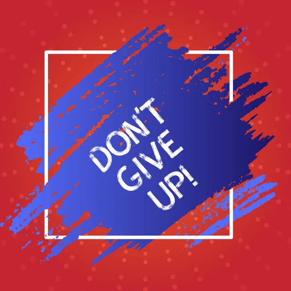 Conceptual hand writing showing Don T Give Up. Business photo text you should continue doing what you are good at Resist Blue Tone Paint Inside Square Line Frame. Smudges with Blank Space.