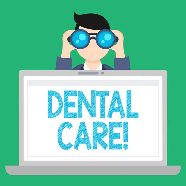 Word writing text Dental Care. Business concept for maintenance of healthy teeth and may refer to Oral hygiene Man Holding and Looking into Binocular Behind Open Blank Space Laptop Screen. — Stock Photo, Image