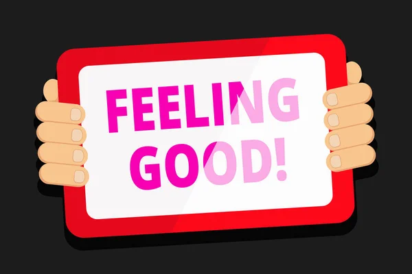 Word writing text Feeling Good. Business concept for causing happy positive feelings about life have satisfaction Color Tablet Smartphone with Blank Screen Handheld from the Back of Gadget.