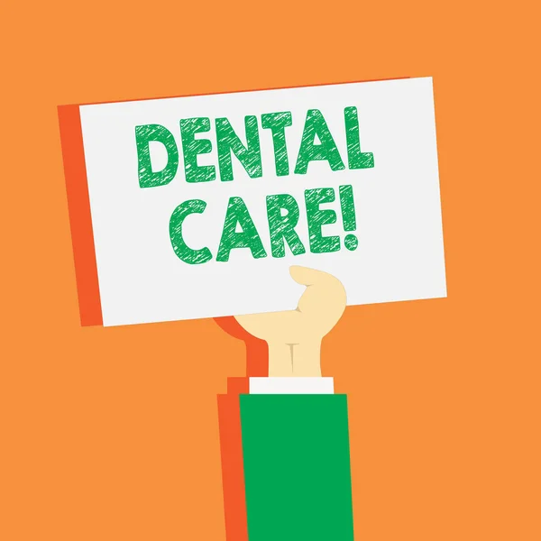 Handwriting text writing Dental Care. Concept meaning maintenance of healthy teeth and may refer to Oral hygiene Clipart of Hand Holding Up Blank Sheet of White Paper on Pastel Backdrop. — Stock Photo, Image