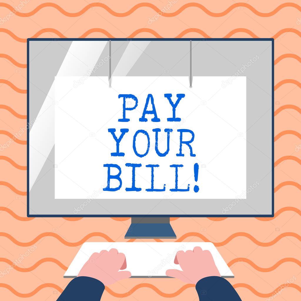 Word writing text Pay Your Bill. Business concept for amount of money to be paid as to workmen or for service Hands on Mockup Keyboard Front of Blank White Monitor with Screen Protector.