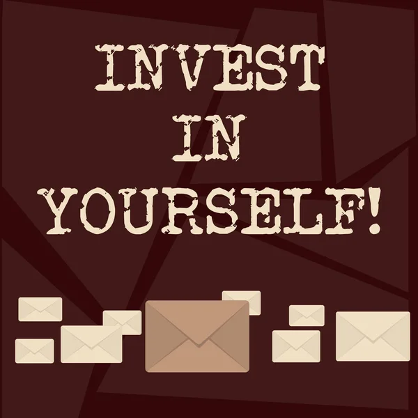 Text sign showing Invest In Yourself. Conceptual photo learn new things or materials thus making your lot better Pastel Color Closed Envelopes in Different Sizes with Big one in the Middle.