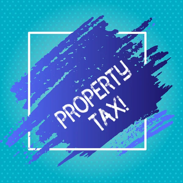 Handwriting text writing Property Tax. Concept meaning bills levied directly on your property by government Blue Tone Paint Inside Square Line Frame. Textured Smudges with Blank Space.