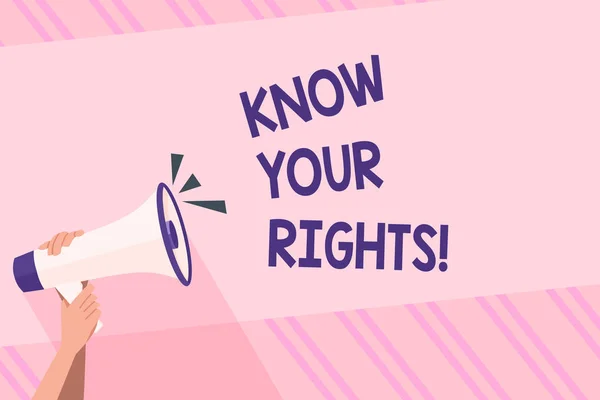 Text sign showing Know Your Rights. Conceptual photo must have knowledge about what you owe to community Human Hand Holding Tightly a Megaphone with Sound Icon and Blank Text Space.