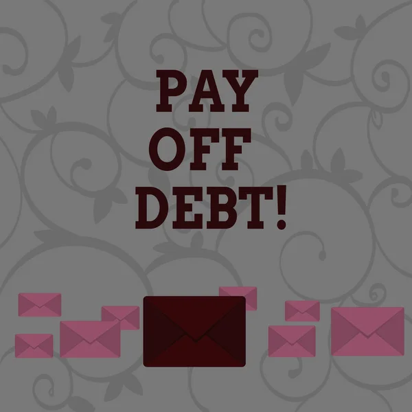 Conceptual hand writing showing Pay Off Debt. Business photo showcasing you give someone or bank all their money that you owe them Color Envelopes in Different Sizes with Big one in Middle.