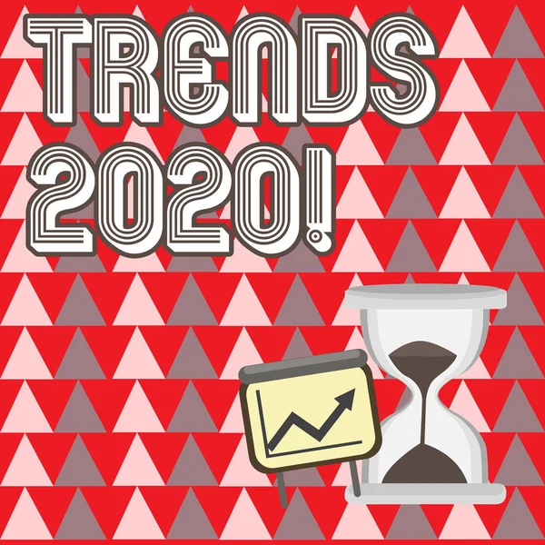 Conceptuele hand schrijven met Trends 2020. Business fotopresentatie van de algemene richting waarin iets is het ontwikkelen van volgend jaar groeigrafiek met pijl omhoog en zandloper zand glijden. — Stockfoto