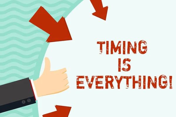 Handwriting text writing Timing Is Everything. Concept meaning Consideration events can influence some desired outcome Hand Gesturing Thumbs Up and Holding on Blank Space Round Shape with Arrows.