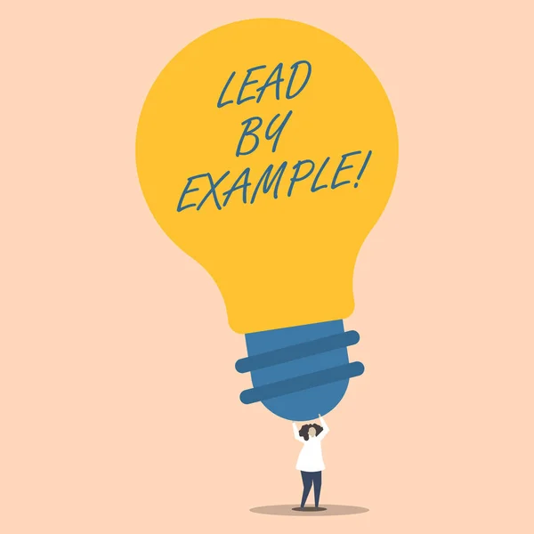 Word writing text Lead By Example. Business concept for you become demonstrating others want to follow for your actions Person Standing and Raising Up Arms Holding Big Yellow Lightbulb for Ideas. — Stock Photo, Image