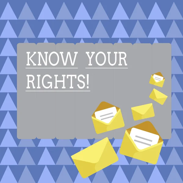 Handwriting text Know Your Rights. Concept meaning must have knowledge about what you owe to community Closed and Open Envelopes with Letter Tucked In on Top of Color Stationery.