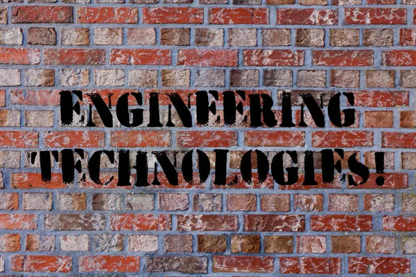 Znak tekstowy przedstawiający technologie inżynieryjne. Koncepcyjny stosowania fotografii wiedzy naukowej i inżynieryjnej Cegła Wall art jak graffiti motywacyjne wezwanie napisane na ścianie. — Zdjęcie stockowe