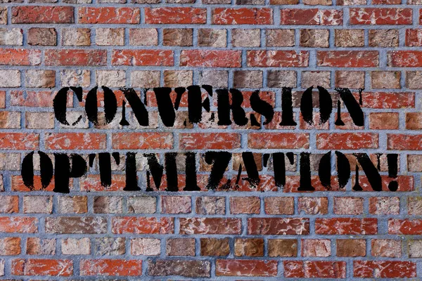 Text sign showing Conversion Optimization. Conceptual photo system increasing percentage of visitors to website Brick Wall art like Graffiti motivational call written on the wall.
