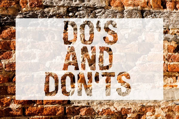 Handwriting text Do S And Don Ts. Concept meaning Rules or customs concerning some activity or actions Brick Wall art like Graffiti motivational call written on the wall. — Stock Photo, Image