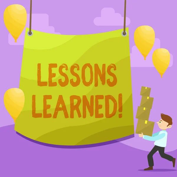 Handwriting text writing Lessons Learned. Concept meaning learning gained from process of performing project Man Carrying Pile of Boxes with Blank Tarpaulin in the Center and Balloons. — Stock Photo, Image