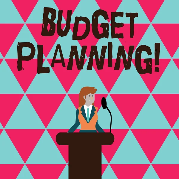 Conceptual hand writing showing Budget Planning. Business photo text process company or individuals evaluate earnings expenses Businesswoman Behind Podium Rostrum Speaking on Microphone.