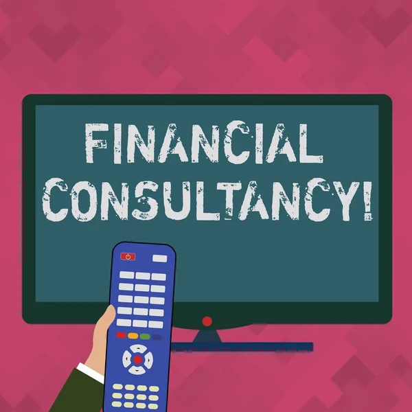 Word writing text Financial Consultancy. Business concept for Company that gives demonstrating advice about their finances Hand Holding Computer Remote Control infront of Blank Wide Color PC Screen.