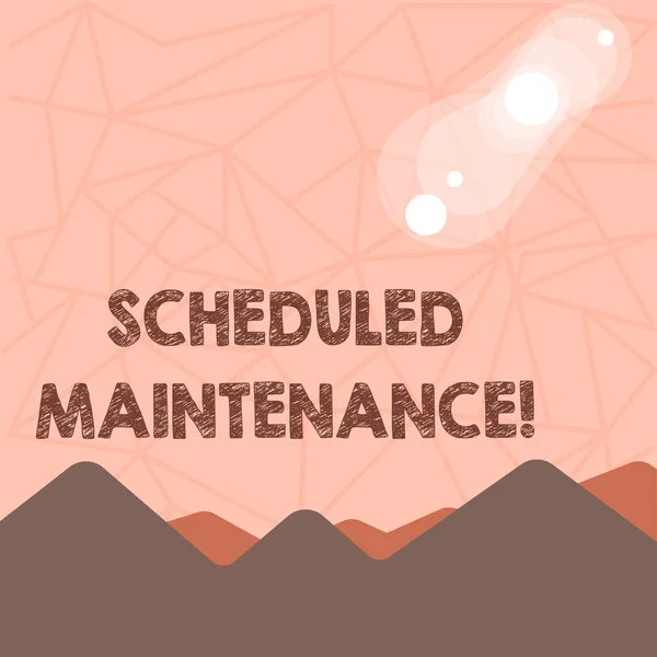 Writing note showing Scheduled Maintenance. Business photo showcasing predetermined maintenance carried out at regular time View of Colorful Mountains and Hills Lunar and Solar Eclipse.