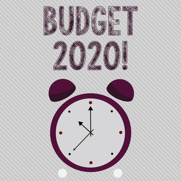 Writing note showing Budget 2020. Business photo showcasing estimate of income and expenditure for next or current year Colorful Round Analog Two Bell Alarm Desk Clock with Seconds Hand photo.