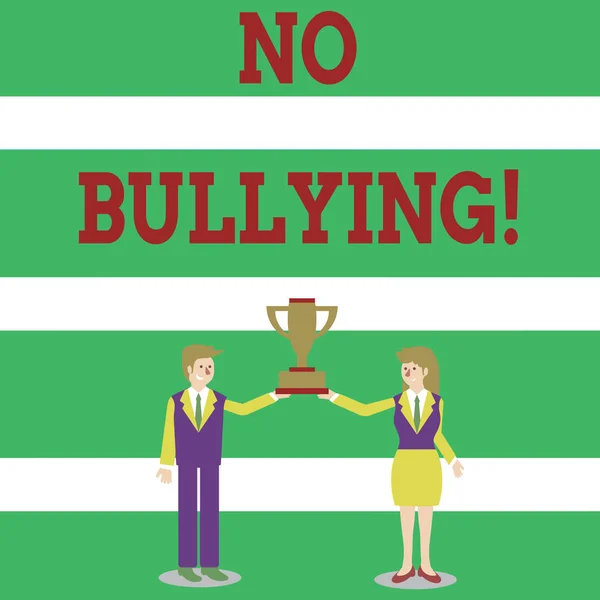 Escribiendo nota que muestra No Bullying. Foto de negocios mostrando detener el comportamiento agresivo entre los niños desequilibrio de poder Man and Woman Business Suit Holding Championship Trophy Cup . —  Fotos de Stock