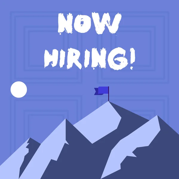 Writing note showing Now Hiring. Business photo showcasing finding evaluating working relationship with future employees Mountains with Shadow Indicating Time of Day and Flag Banner. — Stock Photo, Image