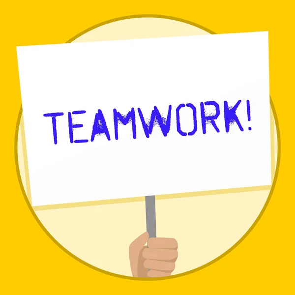 Text sign showing Teamwork. Conceptual photo combined action of group especially when effective and efficient Hand Holding Blank White Placard Supported by Handle for Social Awareness.