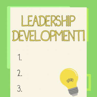 El yazısı metin yazma liderlik geliştirme. Gösteren kavramı anlam programı daha iyi liderler haline gösterir ışık ampul filament ile akkor lamba boş renkli kağıt üzerinde Istirahat.
